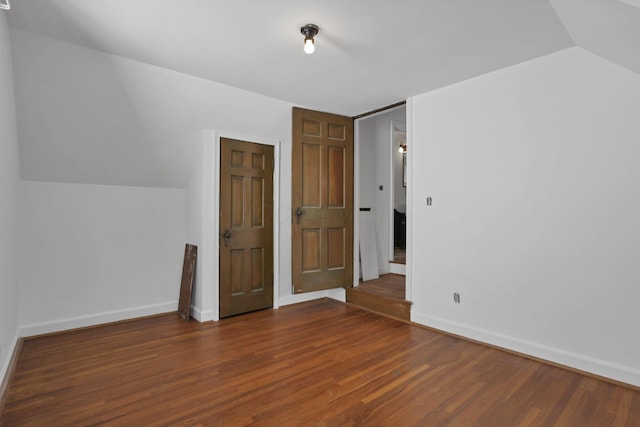 104 W Rathbone Ave, Columbus, OH 43214 - bonus room with dark wood-type flooring, baseboards, and vaulted ceiling