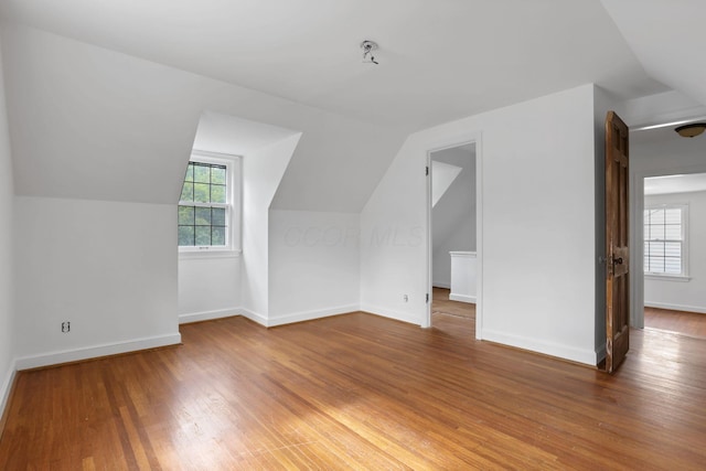 104 W Rathbone Ave, Columbus, OH 43214 - additional living space featuring vaulted ceiling, light wood finished floors, and baseboards