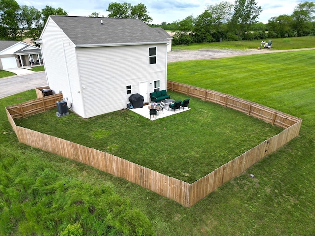 324 Genoa Rd, Commercial Point, OH 43116 - rear view of property with a patio and a shingled roof