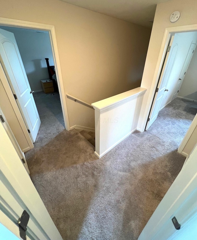 324 Genoa Rd, Commercial Point, OH 43116 - corridor featuring an upstairs landing, carpet floors, and baseboards