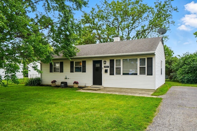 4367 San Jose Ln, Columbus, OH 43213 - ranch-style home with a front yard, a chimney, and roof with shingles