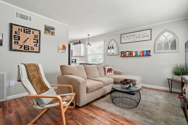 4367 San Jose Ln, Columbus, OH 43213 - living room featuring crown molding, wood finished floors, and baseboards