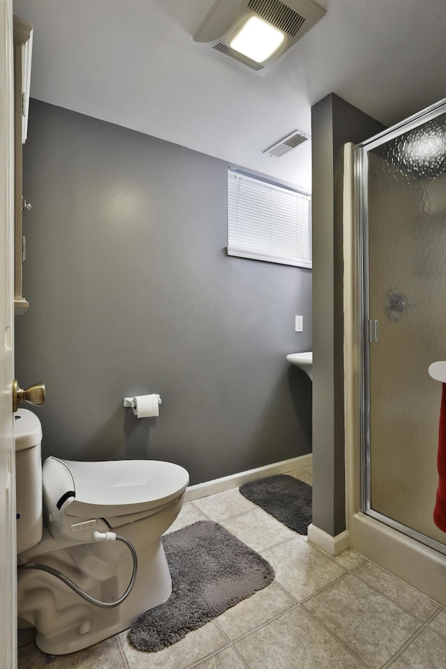 72 Glenmont Ave, Columbus, OH 43214 - full bath featuring toilet, a shower stall, and tile patterned flooring