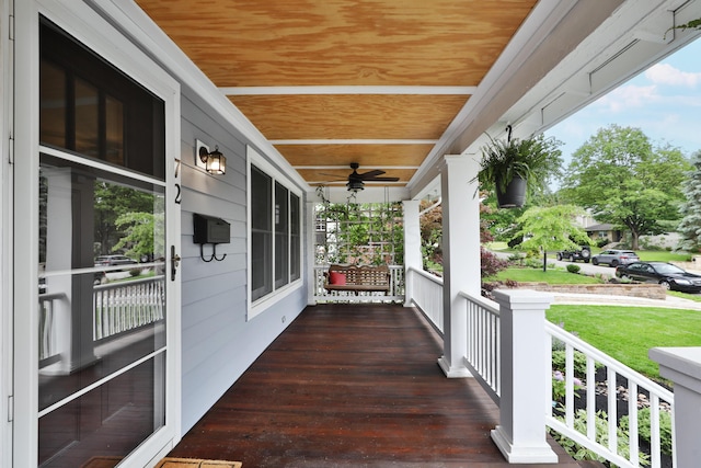 72 Glenmont Ave, Columbus, OH 43214 - wooden porch featuring ceiling fan