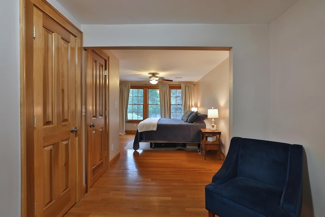 72 Glenmont Ave, Columbus, OH 43214 - bedroom with light wood-type flooring, baseboards, and a ceiling fan