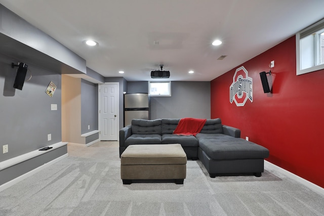 72 Glenmont Ave, Columbus, OH 43214 - home theater room featuring light carpet, recessed lighting, plenty of natural light, and baseboards