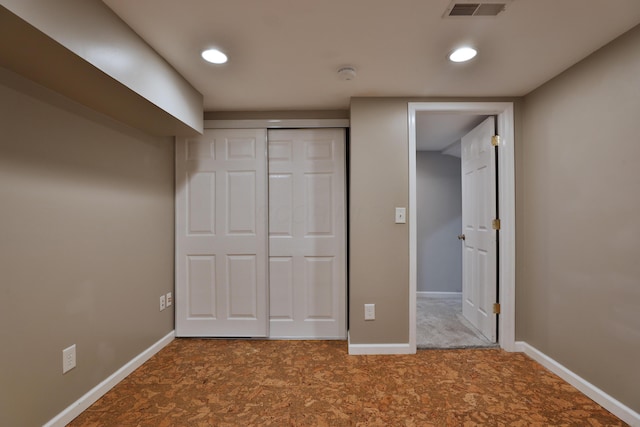 72 Glenmont Ave, Columbus, OH 43214 - unfurnished bedroom with carpet, baseboards, recessed lighting, and a closet