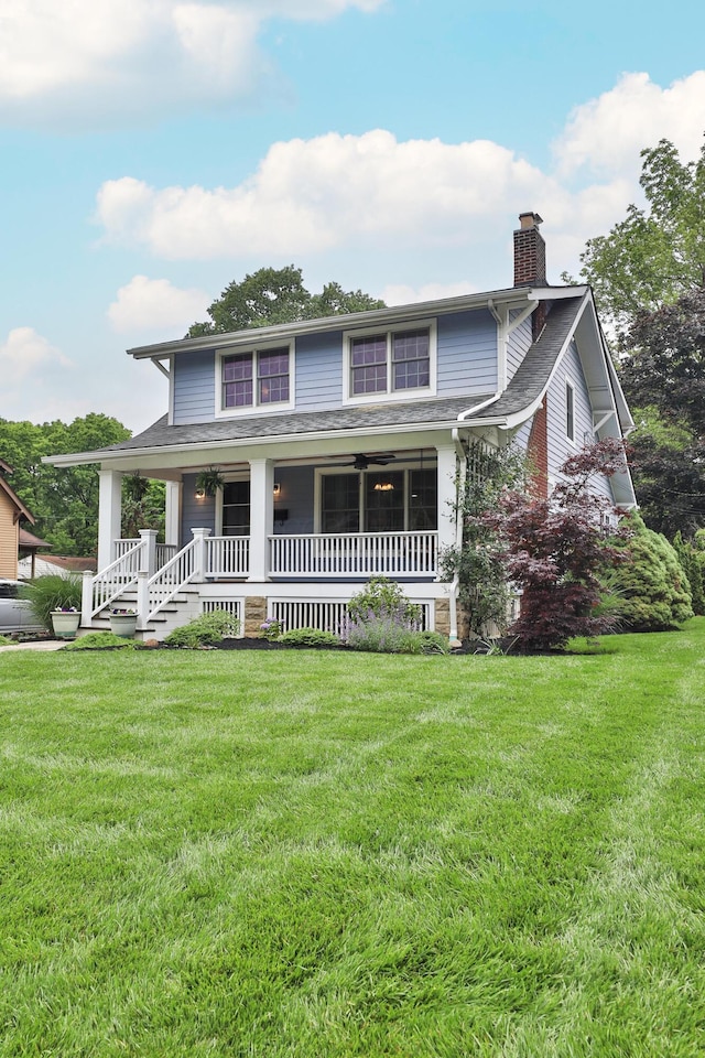 72 Glenmont Ave, Columbus, OH 43214 - view of front of house featuring a chimney, a porch, a front yard, and a shingled roof