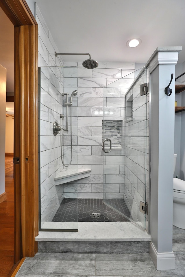 72 Glenmont Ave, Columbus, OH 43214 - bathroom with toilet and a stall shower