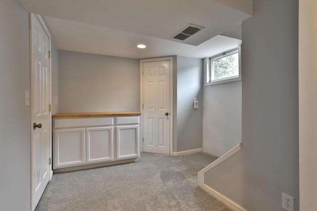 72 Glenmont Ave, Columbus, OH 43214 - hall featuring light carpet, baseboards, and recessed lighting