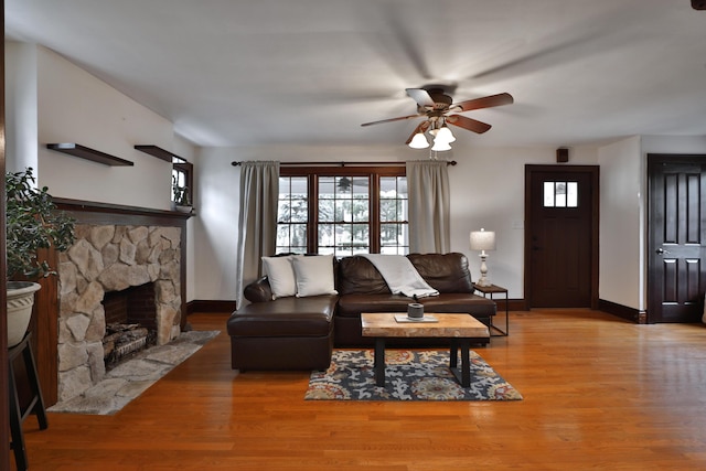 72 Glenmont Ave, Columbus, OH 43214 - living room featuring baseboards, a ceiling fan, and healthy amount of natural light