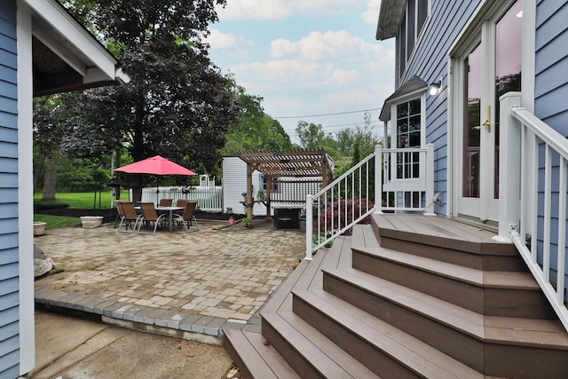 72 Glenmont Ave, Columbus, OH 43214 - wooden terrace featuring outdoor dining space, a patio area, a pergola, and stairs