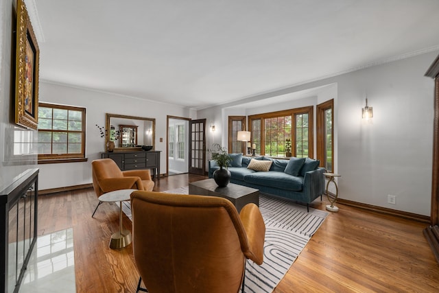 2656 Fair Ave, Columbus, OH 43209 - living room with wood finished floors, plenty of natural light, baseboards, and ornamental molding
