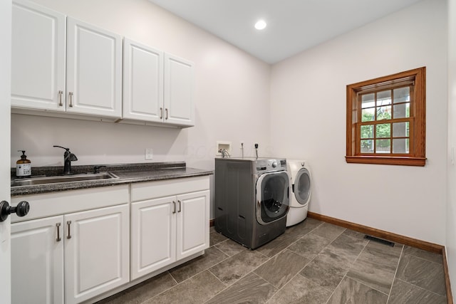 2656 Fair Ave, Columbus, OH 43209 - washroom with washing machine and dryer, cabinet space, baseboards, and recessed lighting