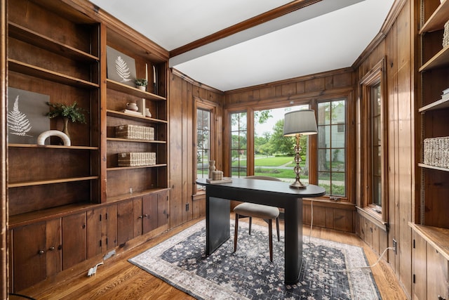 2656 Fair Ave, Columbus, OH 43209 - home office with wooden walls, crown molding, and light wood-style floors