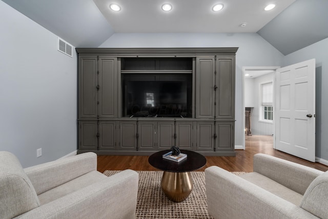 2656 Fair Ave, Columbus, OH 43209 - living room with lofted ceiling, dark wood-style flooring, baseboards, and recessed lighting