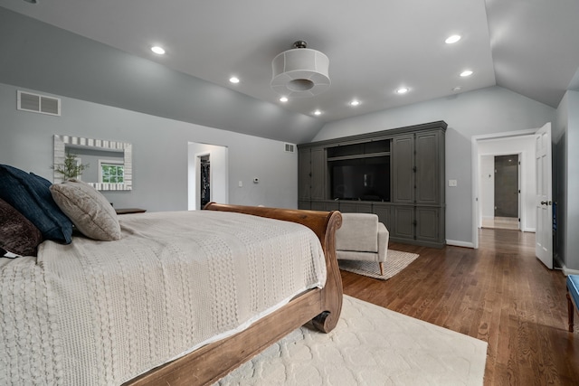2656 Fair Ave, Columbus, OH 43209 - bedroom featuring vaulted ceiling, dark wood-style flooring, recessed lighting, a spacious closet, and baseboards