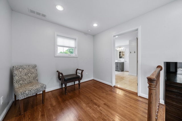 2656 Fair Ave, Columbus, OH 43209 - living area with wood finished floors, baseboards, a chandelier, and recessed lighting