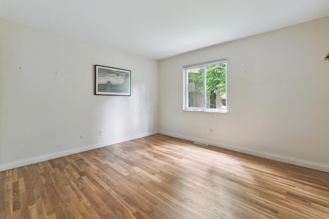 301 Fenway Rd Unit C, Columbus, OH 43214 - empty room with light wood-style flooring and baseboards