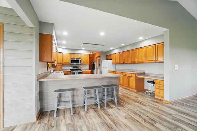 2580 Lafayette Plain City Rd, London, OH 43140 - kitchen with stainless steel appliances, a sink, a peninsula, light countertops, and recessed lighting