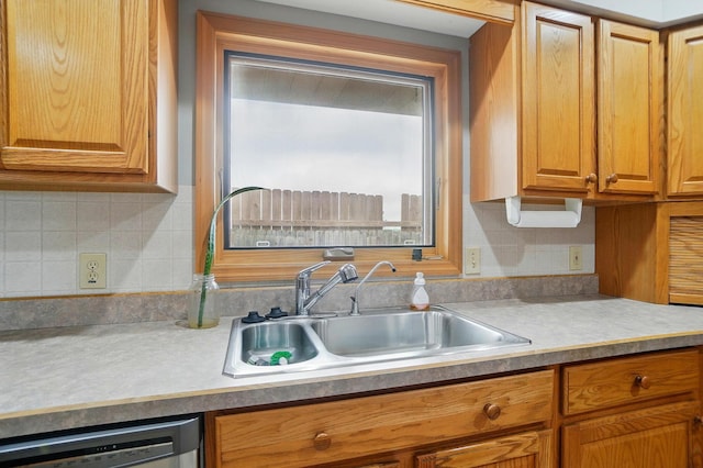 2580 Lafayette Plain City Rd, London, OH 43140 - kitchen with a sink, dishwasher, decorative backsplash, and brown cabinetry