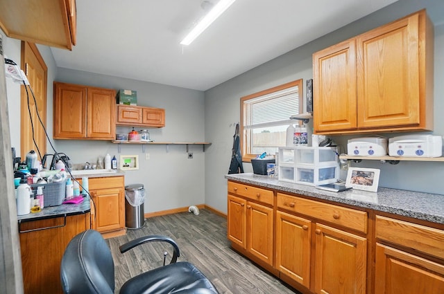 2580 Lafayette Plain City Rd, London, OH 43140 - kitchen with open shelves, wood finished floors, baseboards, a sink, and brown cabinets