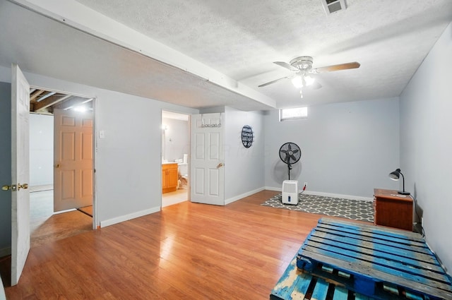 2580 Lafayette Plain City Rd, London, OH 43140 - sitting room featuring light wood-style floors, a ceiling fan, baseboards, and a textured ceiling