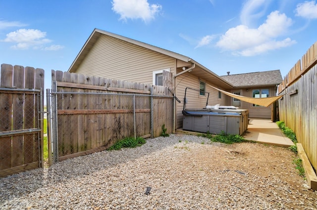 2580 Lafayette Plain City Rd, London, OH 43140 - fenced backyard featuring a hot tub and a gate