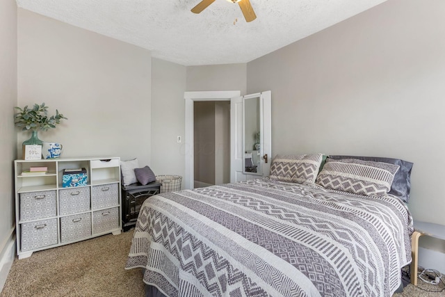 141 E 5th Ave, Lancaster, OH 43130 - carpeted bedroom featuring a ceiling fan and a textured ceiling