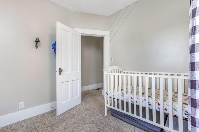 141 E 5th Ave, Lancaster, OH 43130 - carpeted bedroom with a nursery area and baseboards