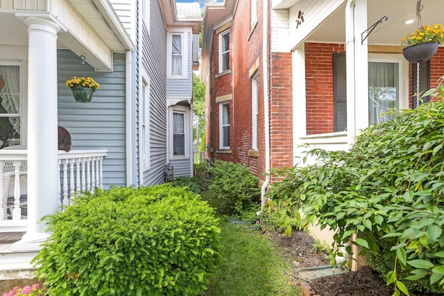 141 E 5th Ave, Lancaster, OH 43130 - entrance to property with brick siding and a porch