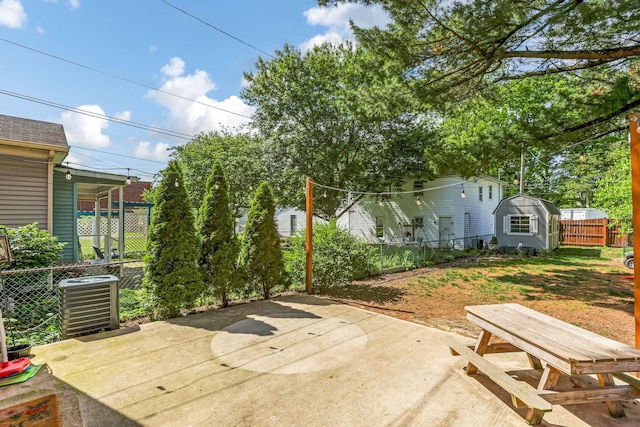 141 E 5th Ave, Lancaster, OH 43130 - fenced backyard with central AC, a patio, and an outdoor structure