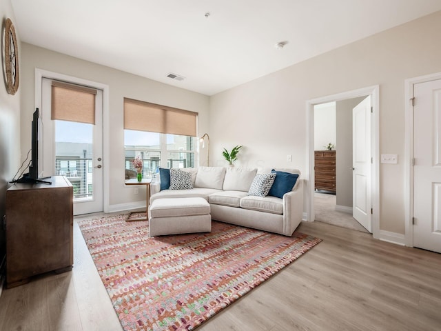6633 Dale Dr Unit 417, Dublin, OH 43017 - living room featuring light wood finished floors and baseboards