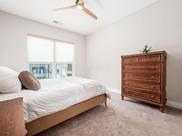 6633 Dale Dr Unit 417, Dublin, OH 43017 - bedroom featuring light colored carpet, baseboards, and a ceiling fan