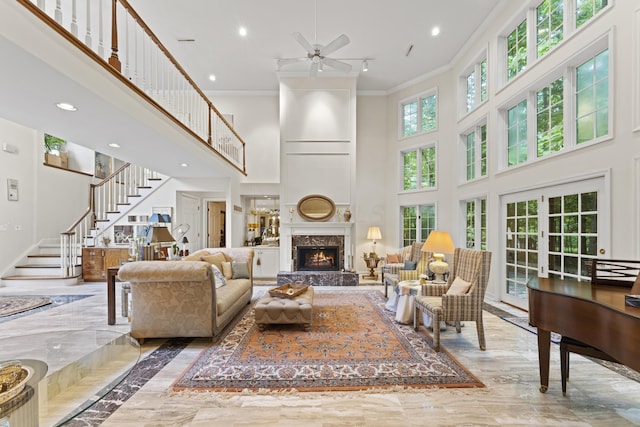 8039 Crossgate Ct S, Dublin, OH 43017 - living room featuring a towering ceiling, marble tiled flooring, crown molding, recessed lighting, and a ceiling fan