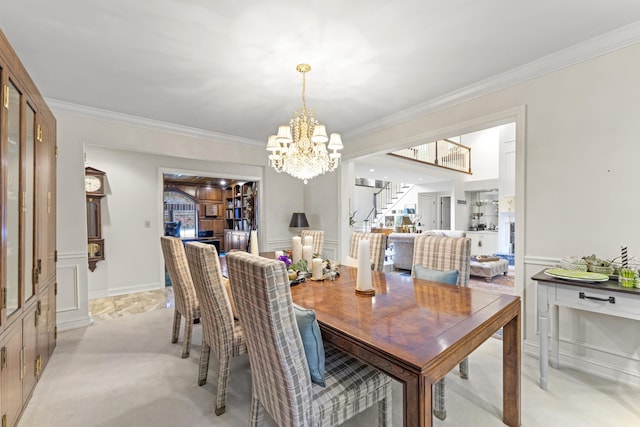 8039 Crossgate Ct S, Dublin, OH 43017 - dining space featuring a chandelier, stairway, ornamental molding, a wainscoted wall, and a decorative wall