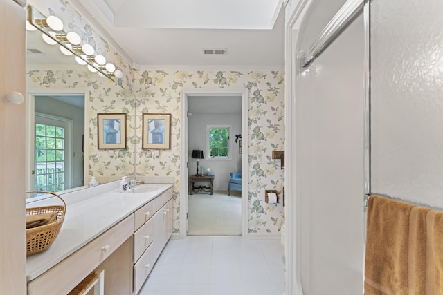 8039 Crossgate Ct S, Dublin, OH 43017 - bathroom with wallpapered walls, vanity, healthy amount of natural light, baseboards, and tile patterned flooring