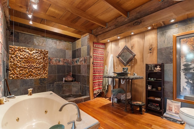 15216 Grove Rd SW Unit Tp142, Port Washington, OH 43837 - full bathroom featuring wood ceiling with exposed beams, wood finished floors, a whirlpool tub, and toilet
