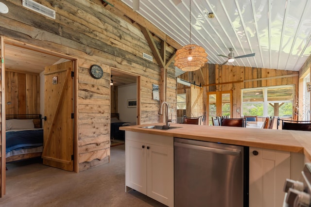 15216 Grove Rd SW Unit Tp142, Port Washington, OH 43837 - kitchen featuring dishwasher, a sink, wooden walls, butcher block countertops, and lofted ceiling