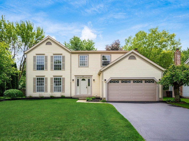 351 Northview Dr, Powell, OH 43065 - view of front facade with driveway and a garage