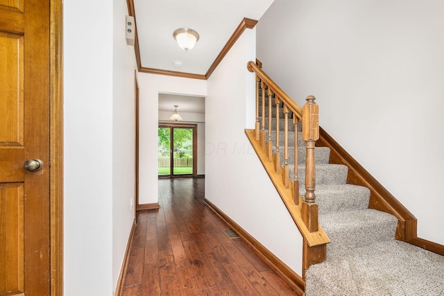 351 Northview Dr, Powell, OH 43065 - staircase with ornamental molding, wood-type flooring, and baseboards