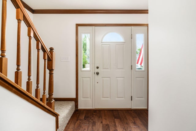 351 Northview Dr, Powell, OH 43065 - entrance foyer with dark wood-style flooring, stairs, baseboards, and crown molding