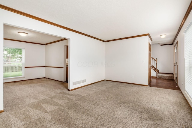351 Northview Dr, Powell, OH 43065 - empty room featuring carpet flooring, ornamental molding, baseboards, and stairs