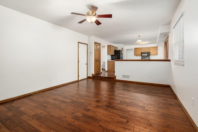 351 Northview Dr, Powell, OH 43065 - unfurnished living room with ceiling fan, dark wood-type flooring, and baseboards