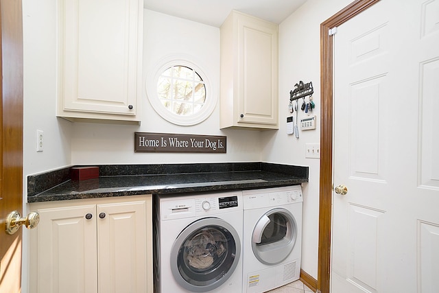 5714 Zetland Ct, Dublin, OH 43017 - laundry room featuring washing machine and clothes dryer and cabinet space
