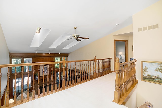 5714 Zetland Ct, Dublin, OH 43017 - corridor with a skylight, an upstairs landing, and lofted ceiling