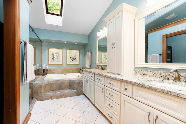 5714 Zetland Ct, Dublin, OH 43017 - full bathroom with double vanity, a garden tub, a skylight, tile patterned flooring, and vaulted ceiling