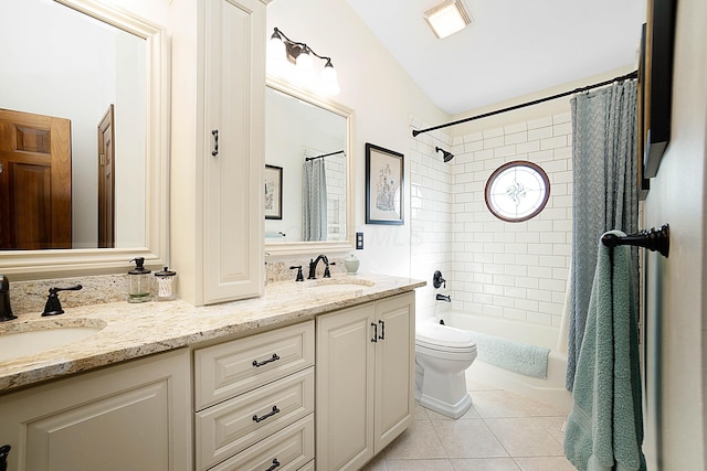 5714 Zetland Ct, Dublin, OH 43017 - bathroom with double vanity, shower / bath combination with curtain, tile patterned flooring, toilet, and vaulted ceiling