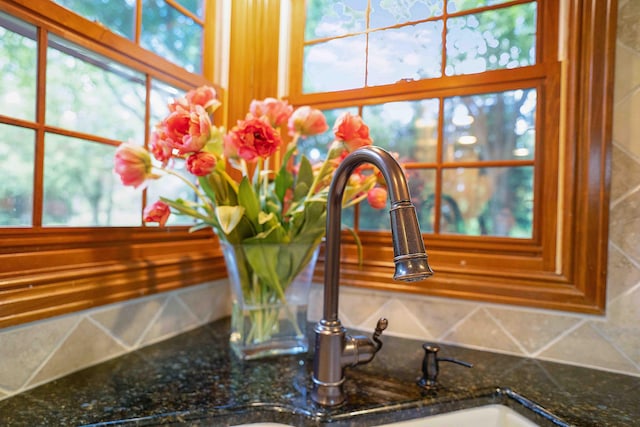5714 Zetland Ct, Dublin, OH 43017 - kitchen view of dark stone countertops and backsplash
