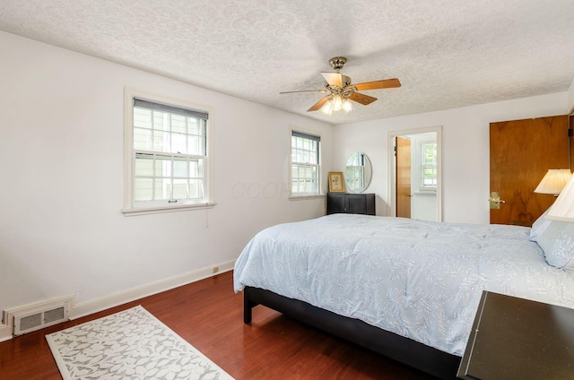 193 N Remington Rd, Columbus, OH 43209 - bedroom featuring wood finished floors, a textured ceiling, baseboards, and ceiling fan